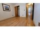 Cozy bedroom with hardwood floors and closet featuring access to the hallway and bathroom at 7336 20Th N St, St Petersburg, FL 33702