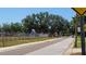 Community playground with a blue-and-red play structure and surrounding chain link fence at 7336 20Th N St, St Petersburg, FL 33702