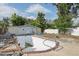 Backyard with a partially filled pool, shed and mature trees at 757 32Nd N Ave, St Petersburg, FL 33704