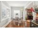 Bright dining room features hardwood floors, classic trim, and ample natural light through large windows at 757 32Nd N Ave, St Petersburg, FL 33704