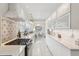 Stylish modern kitchen with sleek white cabinetry, stainless steel appliances, and open layout design at 757 32Nd N Ave, St Petersburg, FL 33704