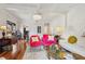 Bright living room with hardwood floors, white brick walls and view to back at 757 32Nd N Ave, St Petersburg, FL 33704