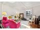 Comfortable living room with white sofa, hardwood floors, and natural light at 757 32Nd N Ave, St Petersburg, FL 33704