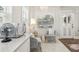 Bright living area featuring white marble floors and a chandelier, plus a glass front door at 757 32Nd N Ave, St Petersburg, FL 33704