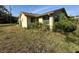 Charming single-story home featuring well-maintained landscaping and a cozy exterior with a lush green yard at 8326 Lafitte Dr, Hudson, FL 34667