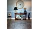Stylish entryway featuring a decorative table, elegant decor, and patterned rug at 836 Magellan Dr, Sarasota, FL 34243