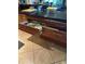 Kitchen island with open drawers showcases organized dishware and serving pieces, enhancing functionality at 836 Magellan Dr, Sarasota, FL 34243