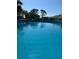 Serene swimming pool area offering a refreshing escape, perfect for relaxation and recreation at 836 Magellan Dr, Sarasota, FL 34243
