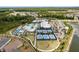 Overhead shot of the new community center showcasing the pool, pickleball courts and lawn bowling at 10982 Banyan Breeze Blvd, Land O Lakes, FL 34638