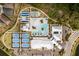 Bird's eye view of the resort-style pool, bocce ball, pickleball courts, and recreation center at 10982 Banyan Breeze Blvd, Land O Lakes, FL 34638