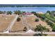 Sprawling estate featuring a large home, expansive grounds, and serene waterfront views at 11715 Taylor Rd, Thonotosassa, FL 33592