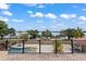 Backyard view from balcony, showcasing the pool and lake at 11715 Taylor Rd, Thonotosassa, FL 33592