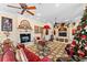 Inviting living room with a fireplace, built-in shelving, and ample seating at 11715 Taylor Rd, Thonotosassa, FL 33592