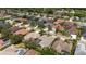 A captivating aerial view showcasing a vibrant community with beautiful homes and lush landscaping at 11910 Keating Dr, Tampa, FL 33626