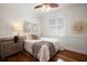 Inviting bedroom with hardwood floors, neutral paint, ample natural light and a cozy atmosphere at 11910 Keating Dr, Tampa, FL 33626