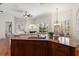Kitchen with granite countertops and view of the living room at 11910 Keating Dr, Tampa, FL 33626