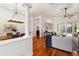 Bright living room with hardwood floors, stylish decor, and an open floor plan at 11910 Keating Dr, Tampa, FL 33626