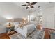 This main bedroom features neutral decor and hardwood floors at 11910 Keating Dr, Tampa, FL 33626