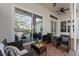Outdoor patio featuring wicker furniture and a view of the pool at 11910 Keating Dr, Tampa, FL 33626