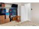 This is an open closet in a bedroom with neutral carpeting at 12400 Park Blvd # 522, Seminole, FL 33772