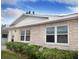 Charming single-story home featuring a stone facade, well-maintained landscaping, and bright, modern windows at 12400 Park Blvd # 522, Seminole, FL 33772