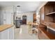 Spacious living area with seamless transition to the dining space and kitchen area, featuring an open layout at 12400 Park Blvd # 522, Seminole, FL 33772