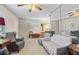 Inviting living room featuring a neutral color palette, plush seating, and a large mirrored wall at 12400 Park Blvd # 522, Seminole, FL 33772