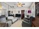 Spacious living room featuring neutral tones, plush seating, and ample natural light at 12400 Park Blvd # 522, Seminole, FL 33772