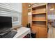 Efficient office space with a desk, ample natural light, and storage at 12400 Park Blvd # 522, Seminole, FL 33772