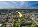 A serene aerial shot shows a property is located in a neighborhood with multiple retention ponds at 14073 Jennifer Ter, Largo, FL 33774