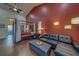 Spacious primary bedroom featuring wood floors, vaulted ceiling and sitting area at 14073 Jennifer Ter, Largo, FL 33774