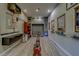 Home gym equipped with rowing machine, weights and posters displayed throughout at 14073 Jennifer Ter, Largo, FL 33774