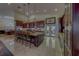 Kitchen area with large island bar seating and stainless steel appliances at 14073 Jennifer Ter, Largo, FL 33774