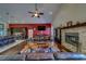 Living room features stone fireplace, and an open floor plan with access to the kitchen at 14073 Jennifer Ter, Largo, FL 33774