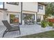 Open backyard with brick patio and outdoor seating that blends style with relaxation at 1502 Creekbend Dr, Brandon, FL 33510