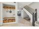 Inviting foyer featuring a mudroom nook with built-in bench, storage, and seamless flow into the home at 1502 Creekbend Dr, Brandon, FL 33510
