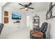 Inviting living room with sleek furniture, shelving, and an entertainment center at 1502 Creekbend Dr, Brandon, FL 33510