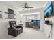 Bright office space with a cozy armchair and functional desk setup, perfect for working from home at 1502 Creekbend Dr, Brandon, FL 33510