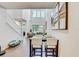Inviting living space with high ceilings, natural light and dining area at 1510 Blue Sea St, Clearwater, FL 33756