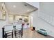 Open-concept living space with a dining area, kitchen, and staircase at 1510 Blue Sea St, Clearwater, FL 33756