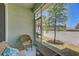 Relaxing screened patio with comfortable seating and views of the landscaped backyard at 1510 Blue Sea St, Clearwater, FL 33756