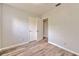 Bedroom with a closet and wood-look flooring at 1511 Meridel Ave, Tampa, FL 33612