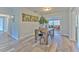 The dining room has modern decor and offers a view to the adjacent living area at 1511 Meridel Ave, Tampa, FL 33612