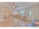 Bright living area featuring modern flooring, neutral tones, and an open layout at 1511 Meridel Ave, Tampa, FL 33612