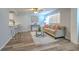 Bright living room with neutral color scheme, modern furnishings, and stylish flooring and ceiling fan at 1511 Meridel Ave, Tampa, FL 33612