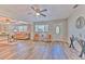 Inviting living room with new flooring, neutral walls, and an open floor plan at 1511 Meridel Ave, Tampa, FL 33612