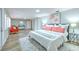 Expansive main bedroom featuring stylish decor, natural light, and wood-look flooring at 1511 Meridel Ave, Tampa, FL 33612