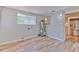 Clean utility room with connections for laundry appliances and view into kitchen at 1511 Meridel Ave, Tampa, FL 33612