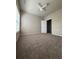 Vaulted bedroom with closet, ceiling fan, and window for natural light at 1530 Villa Capri Cir # 302, Odessa, FL 33556