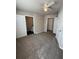 Spacious bedroom with an ensuite bathroom and multiple closets at 1530 Villa Capri Cir # 302, Odessa, FL 33556